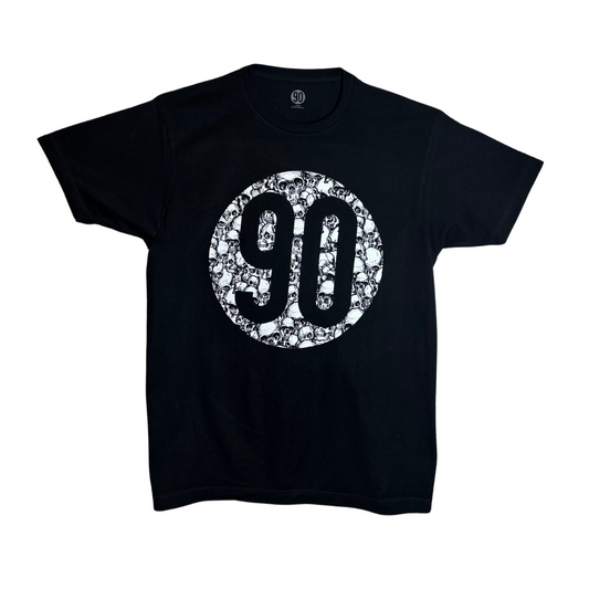 Front view of the 90 Skull Circle Tee, black t-shirt featuring the '90' logo filled with white skulls within a circle.