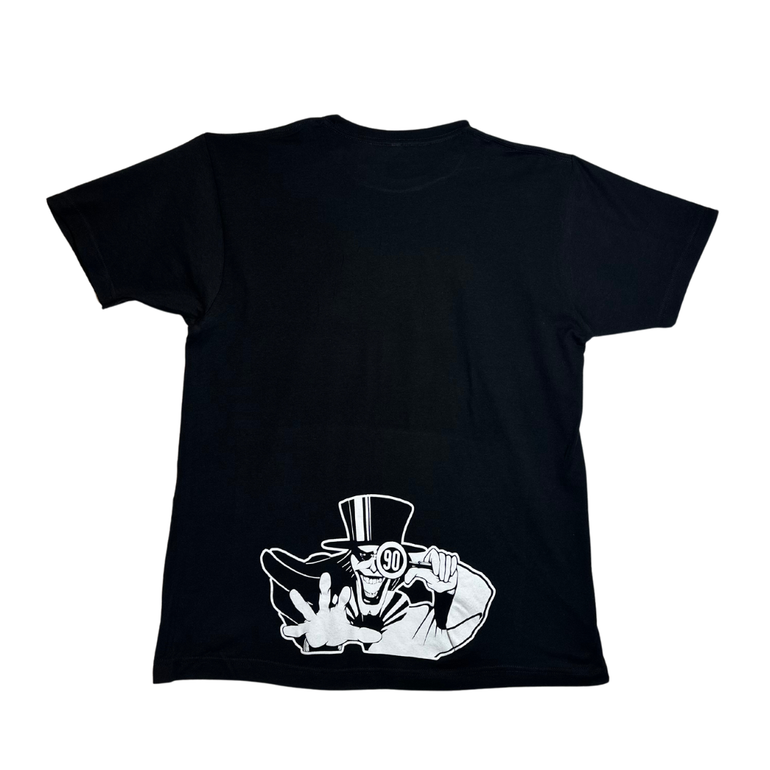 Character peering through 90's magnifying glass on black tee back