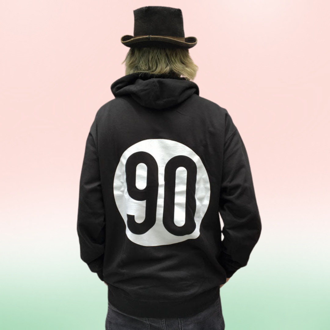 Model showing off the large 90 The Original logo on the back of the Classic 90 Hoodie